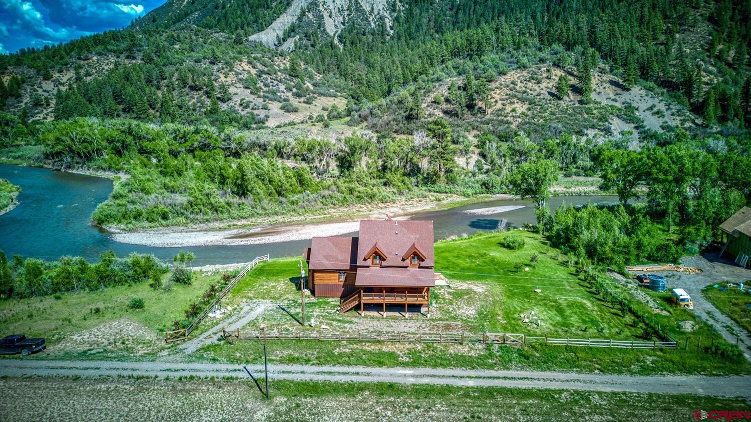 228 Estates Circle Road Pagosa Springs, CO 81147 - Photo 32 of 35 a garden view with a seating space