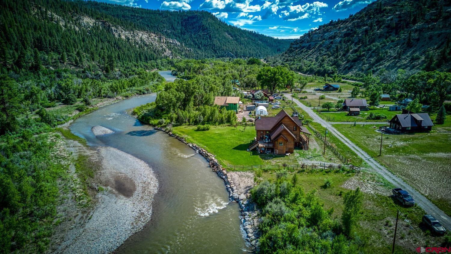 228 Estates Circle Road Pagosa Springs, CO 81147 - Photo 34 of 35 an aerial view of residential house with outdoor space and trees all around