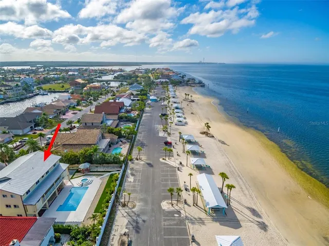 a view of a house with a swimming pool