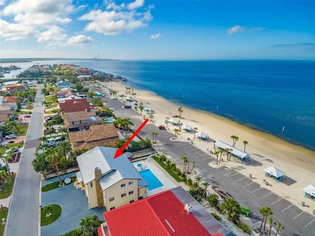 a view of swimming pool with a potted plant