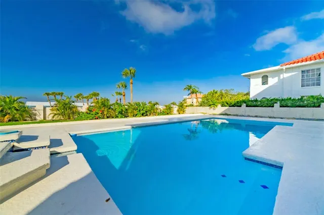 a view of an empty room with a fireplace