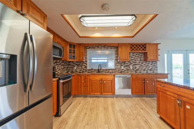a view of livingroom with hardwood floor and a ceiling fan
