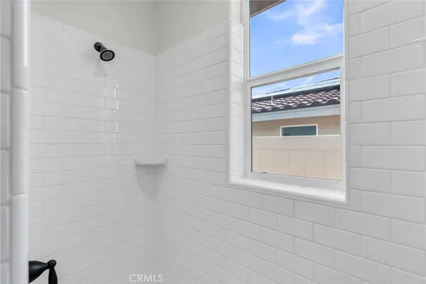 a view of a glass door and a window