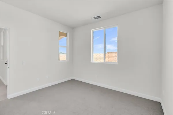 a view of an empty room and outdoor space