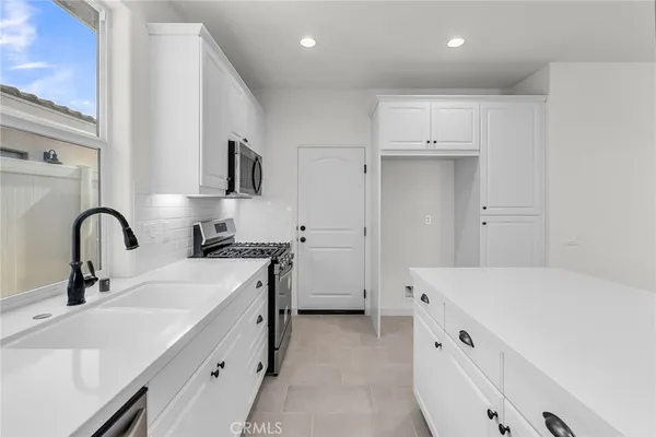 a kitchen with a stove