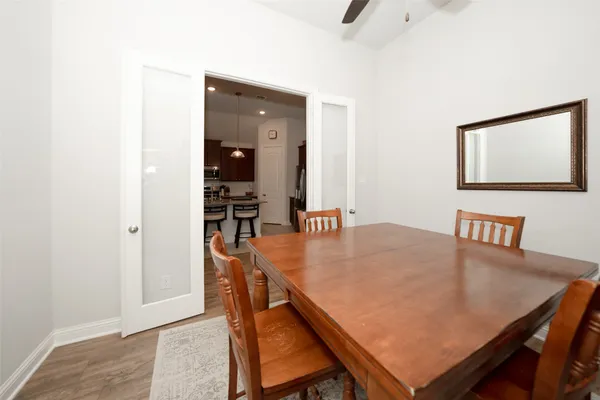 a view of a dining room with furniture