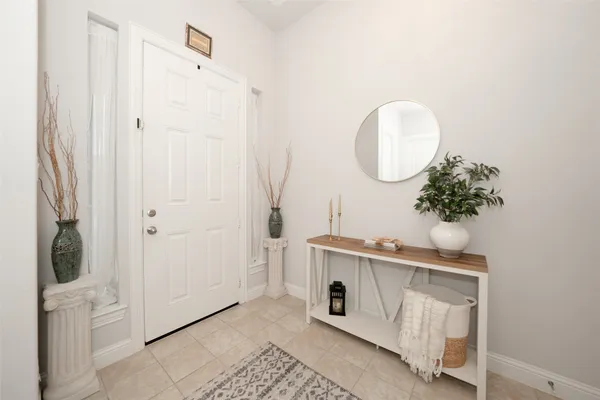 a bathroom with a sink a mirror and vanity