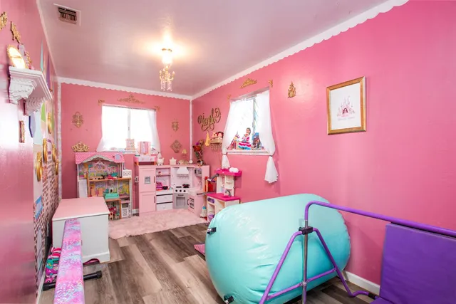 a kitchen with stainless steel appliances granite countertop a stove and a refrigerator