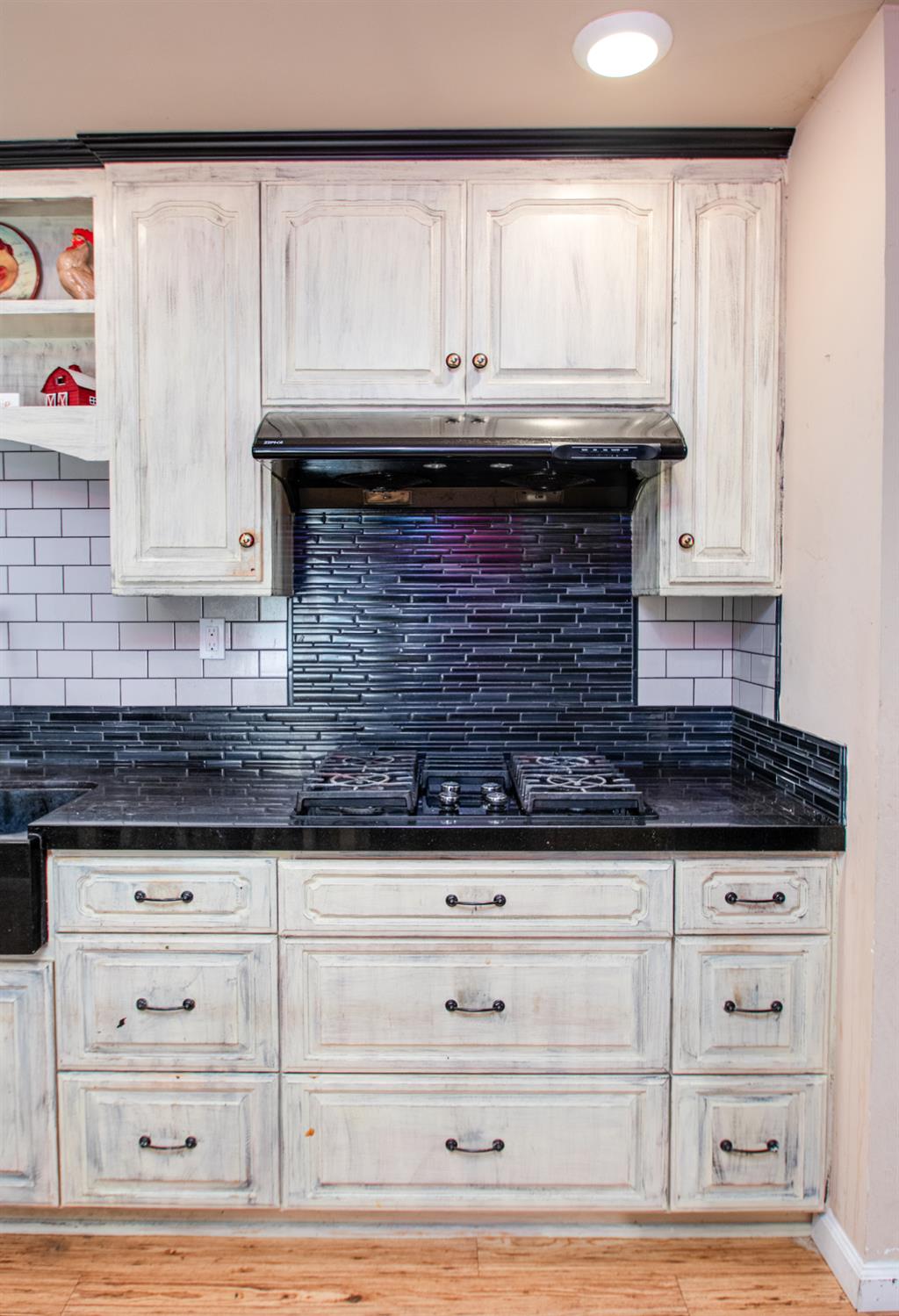 2423 I Street Rio Linda, CA 95673 - Photo 36 of 48 a kitchen with granite countertop a stove and a sink