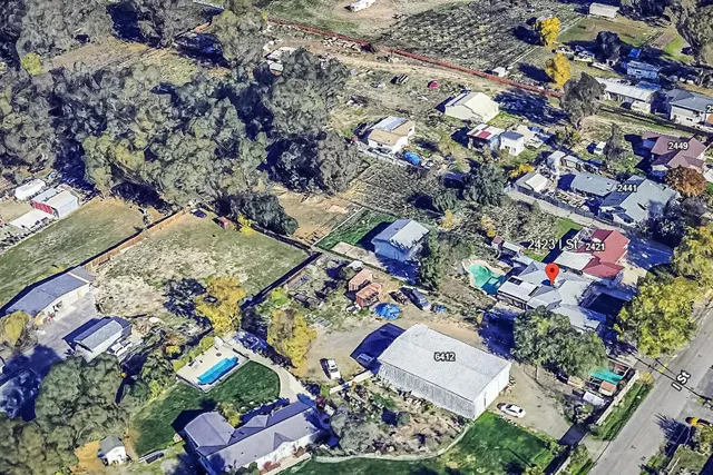 a view of a house with a swimming pool