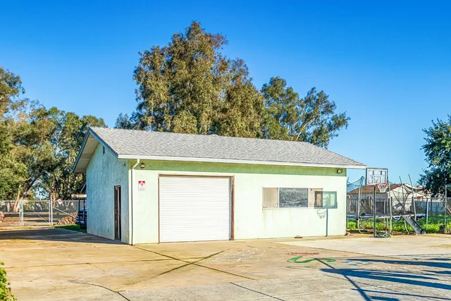 a view of a house with a swimming pool
