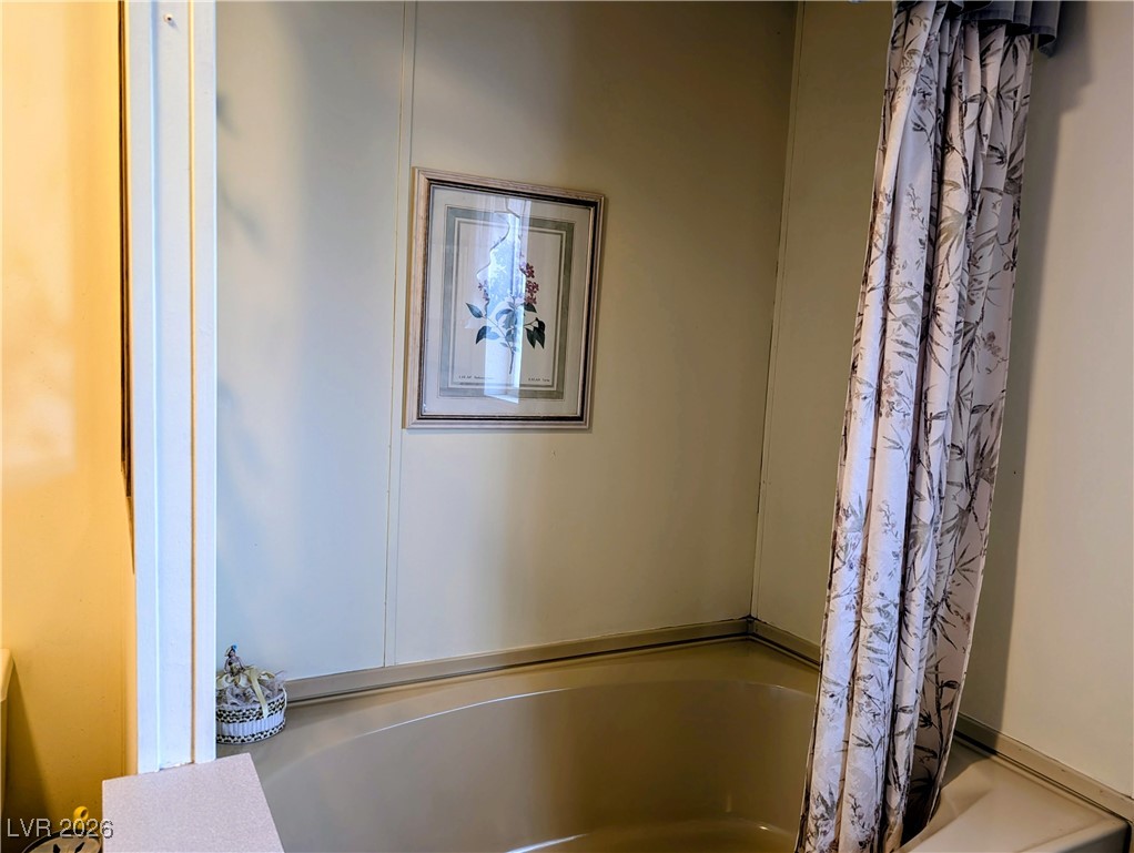 50 North 2nd Street Panaca, NV 89042 - Photo 18 of 35 Full bath with shower / bath combination with curtain