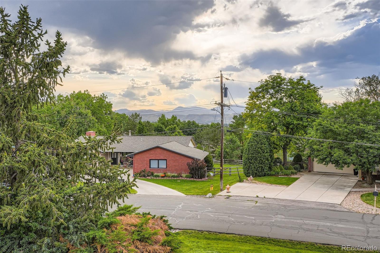 22 Rangeview Drive Wheat Ridge, CO 80215 - Photo 28 of 28 a view of a yard in front of a house