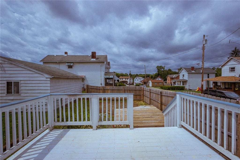 552 Pennsylvania Avenue Rochester, PA 15074 - Photo 14 of 15 Vinyl Decking and Fenced Rear Yard