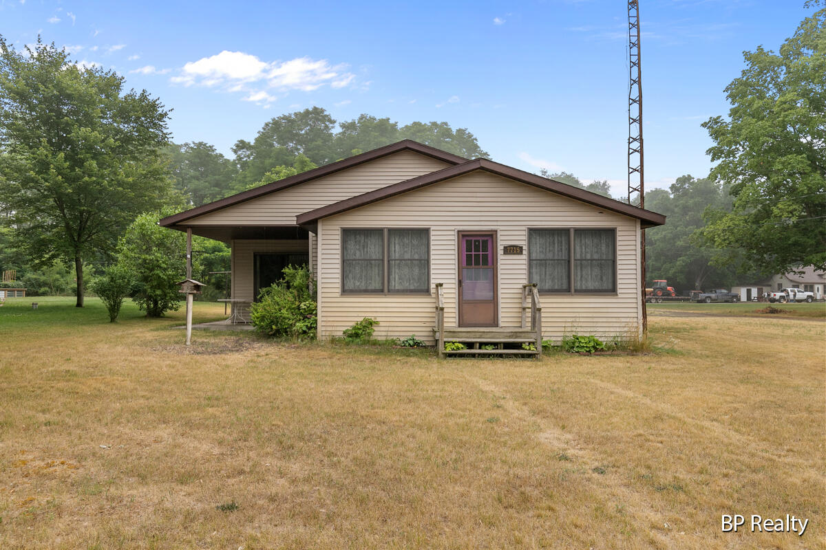 7715 Munger Road Ravenna, MI 49451 - Photo 1 of 25 Front