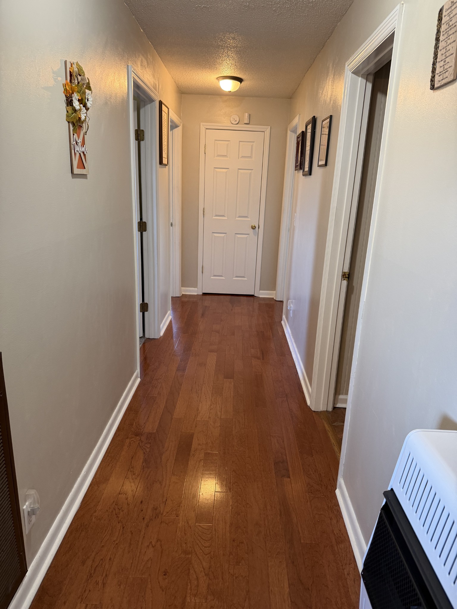8 Mattox Road Lawrenceburg, TN 38464 - Photo 11 of 38 a view of a hallway with wooden floor