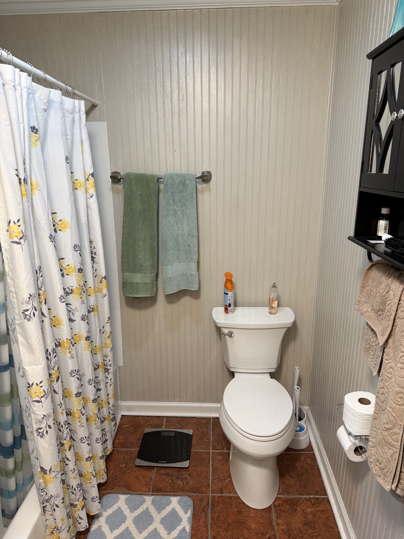 8 Mattox Road Lawrenceburg, TN 38464 - Photo 23 of 38 a bathroom with a toilet and a shower curtain
