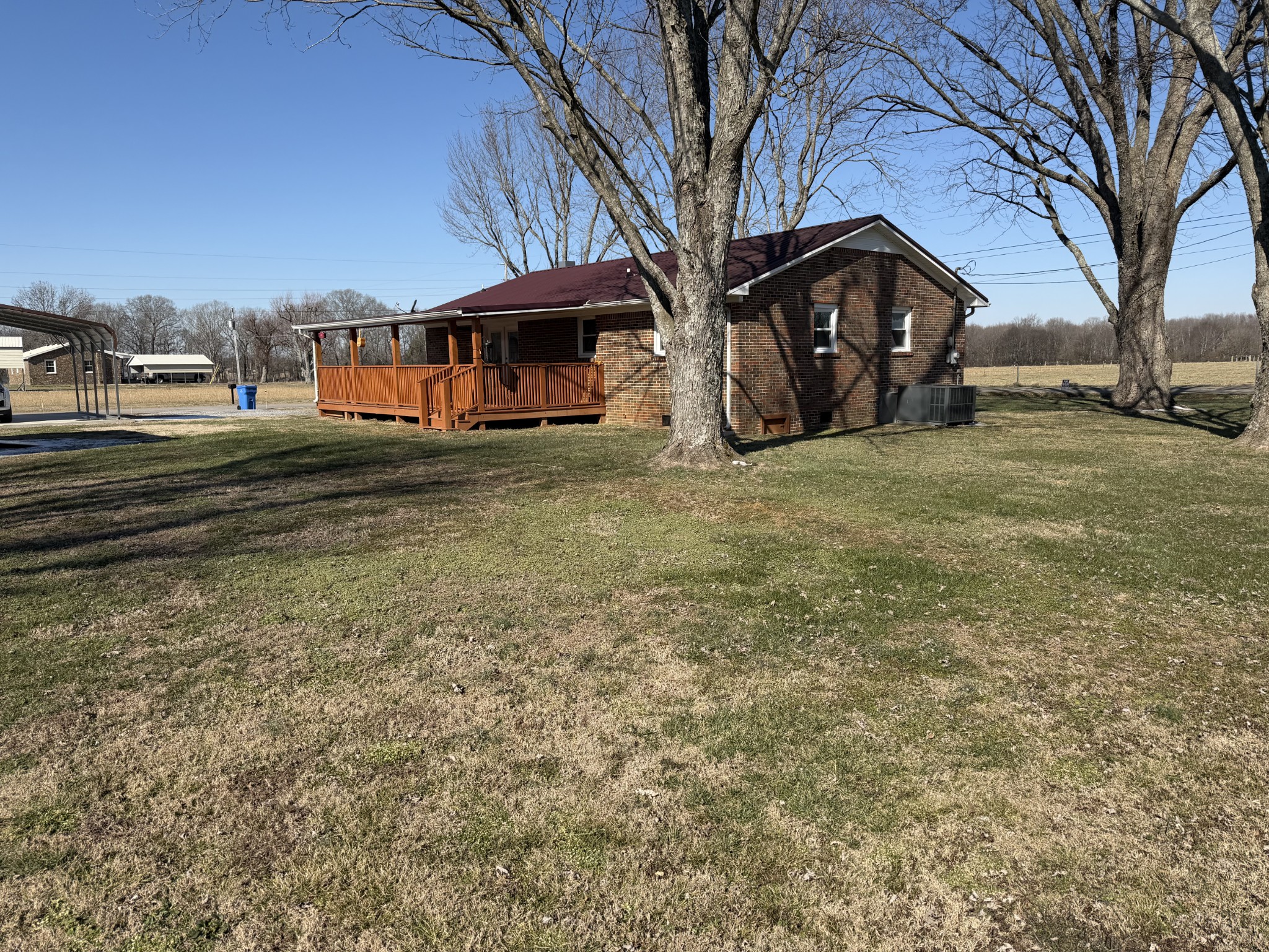 8 Mattox Road Lawrenceburg, TN 38464 - Photo 28 of 38 a view of a house with backyard and sitting area