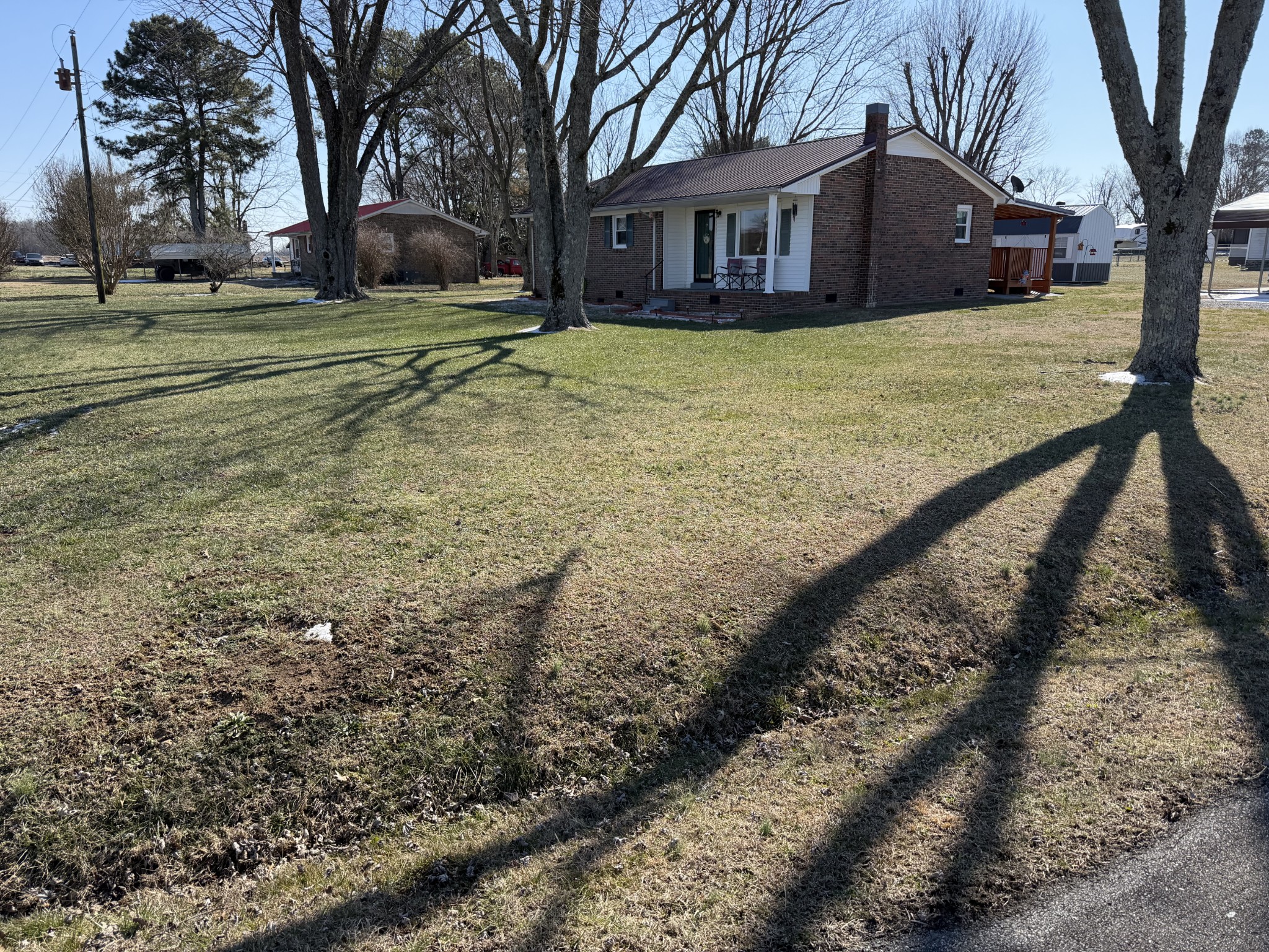 8 Mattox Road Lawrenceburg, TN 38464 - Photo 34 of 38 a view of a house with a yard covered with snow