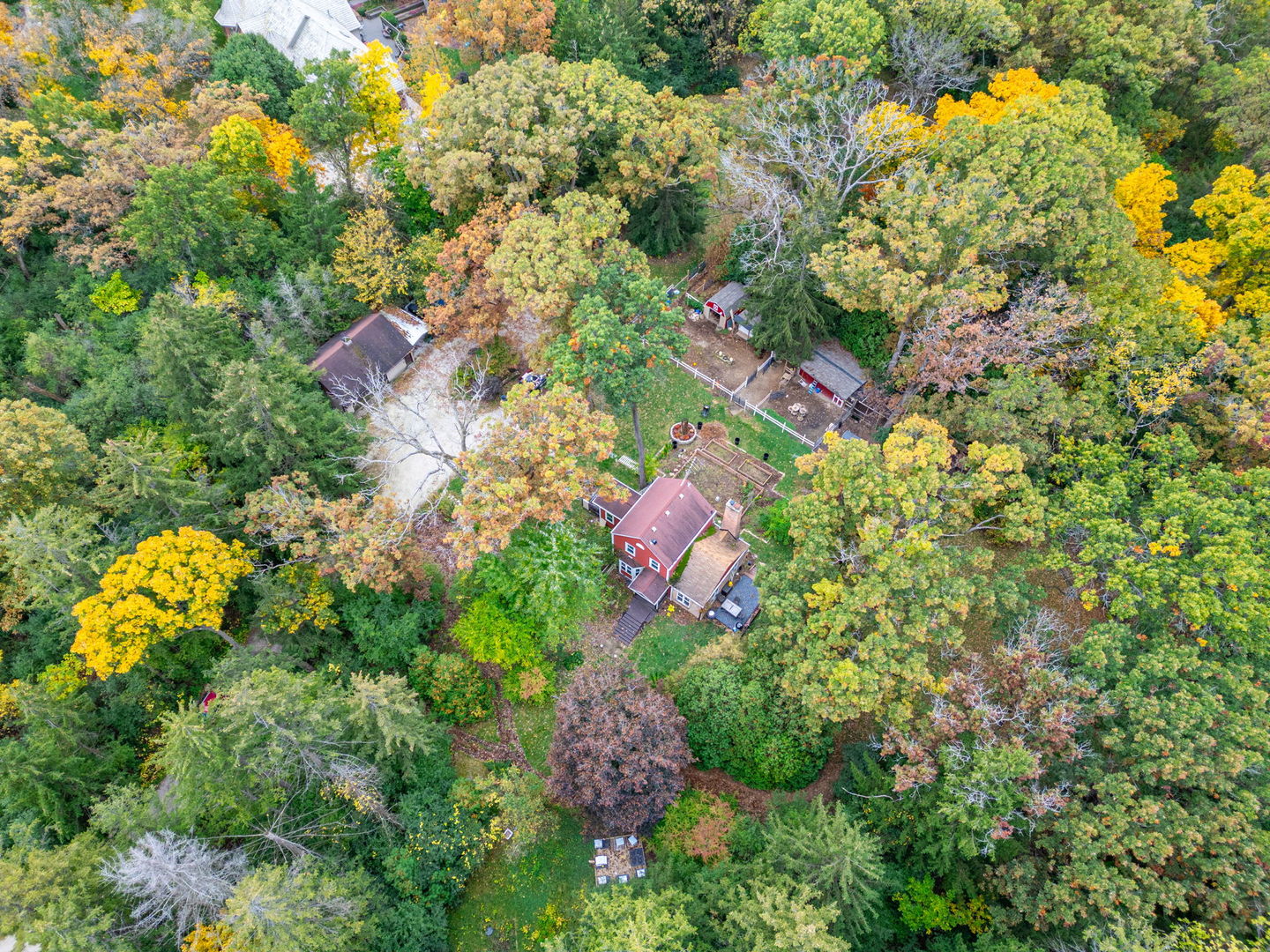 1S151 Winfield Road Wheaton, IL 60189 - Photo 17 of 20 a aerial view of a house with a yard and large trees