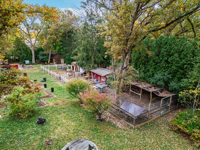 a view of backyard with sitting area