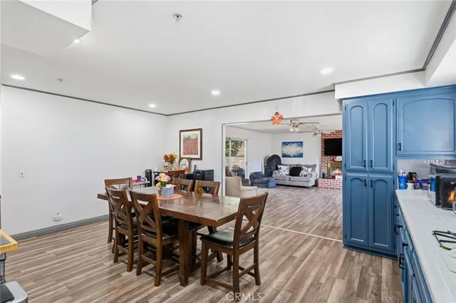 a kitchen with a table and chairs in it