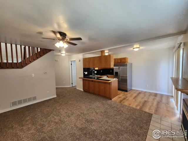 a view of a room with a floor to ceiling window