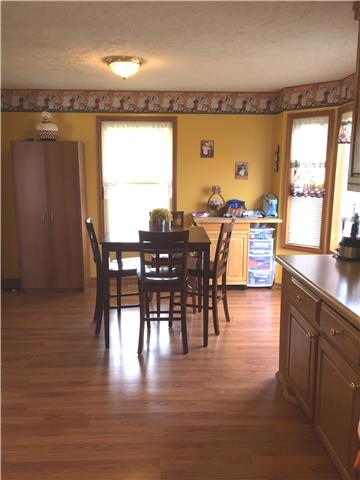 1904 Hunters Run Road Lewisburg, TN 37091 - Photo 5 of 12 View if the dining area with plenty of windows and laminate flooring
