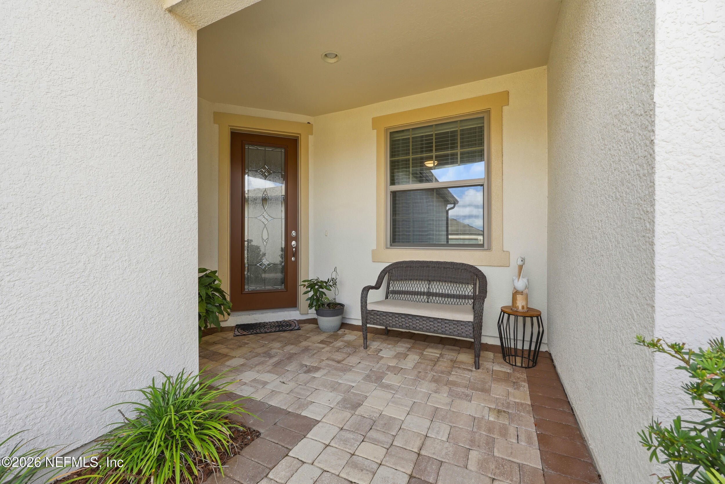 258 Rock Spring Loop St. Augustine, FL 32095 - Photo 2 of 31 a house view with a outdoor space