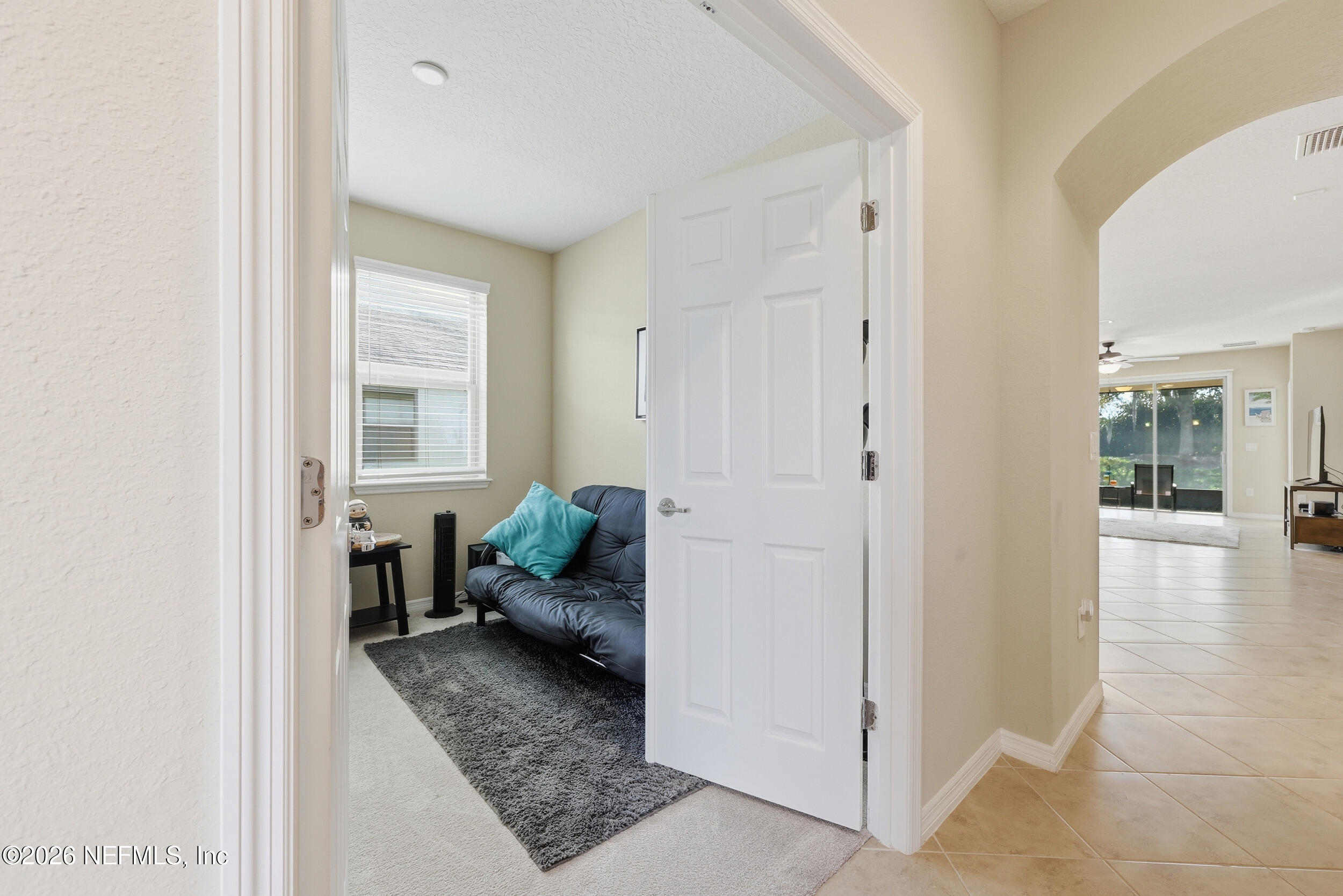 258 Rock Spring Loop St. Augustine, FL 32095 - Photo 23 of 31 a living room with furniture and a rug