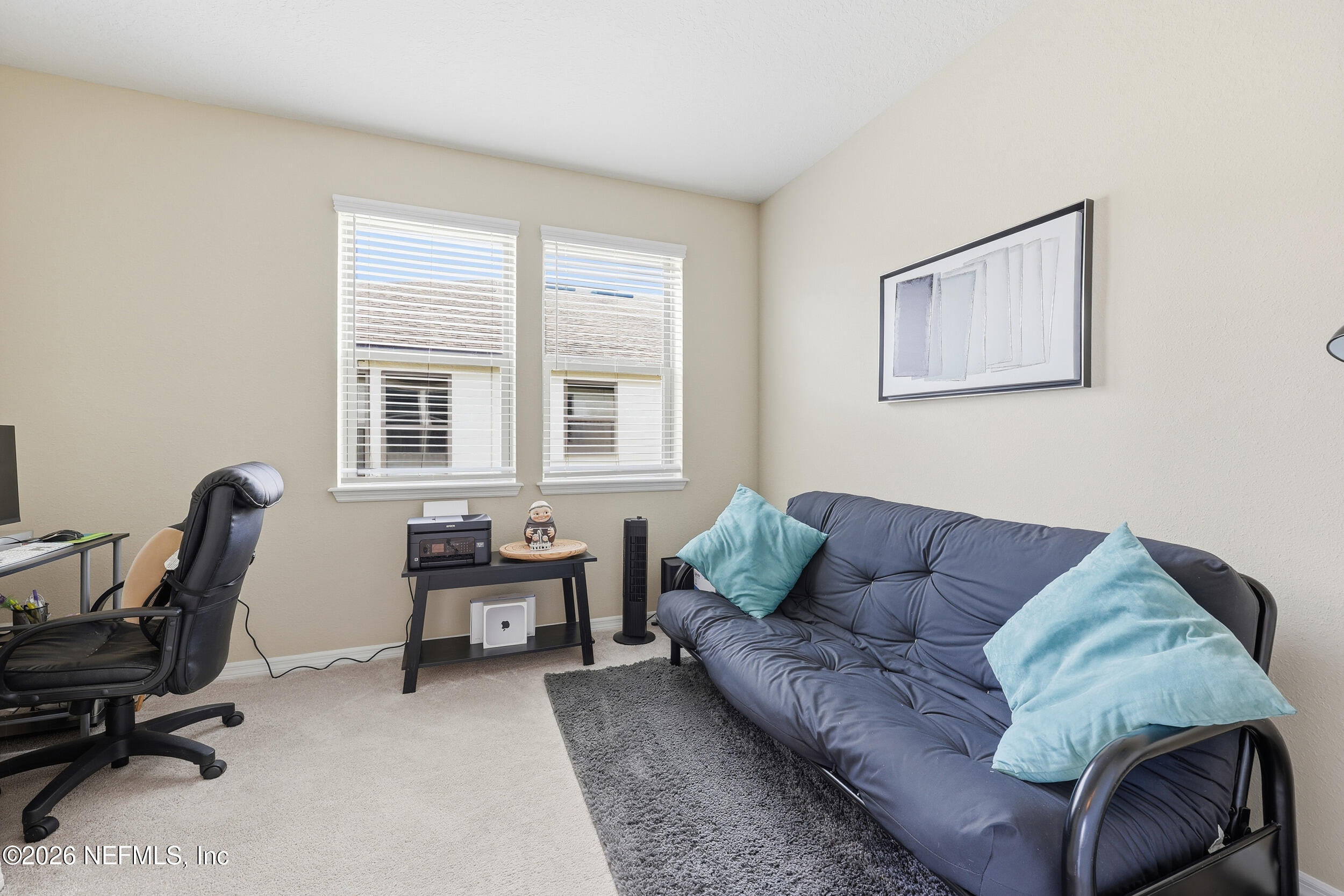 258 Rock Spring Loop St. Augustine, FL 32095 - Photo 24 of 31 a living room with furniture and a window