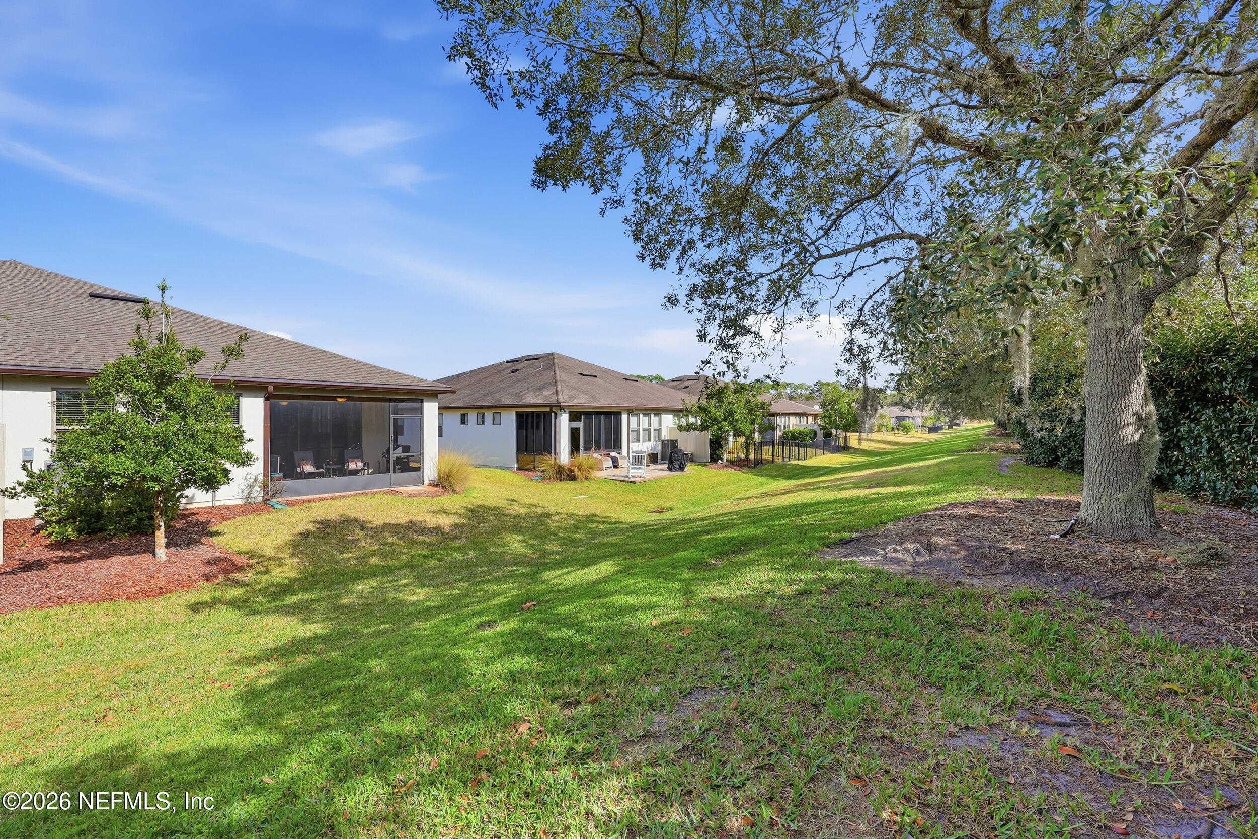 258 Rock Spring Loop St. Augustine, FL 32095 - Photo 28 of 31 a front view of a house with a yard
