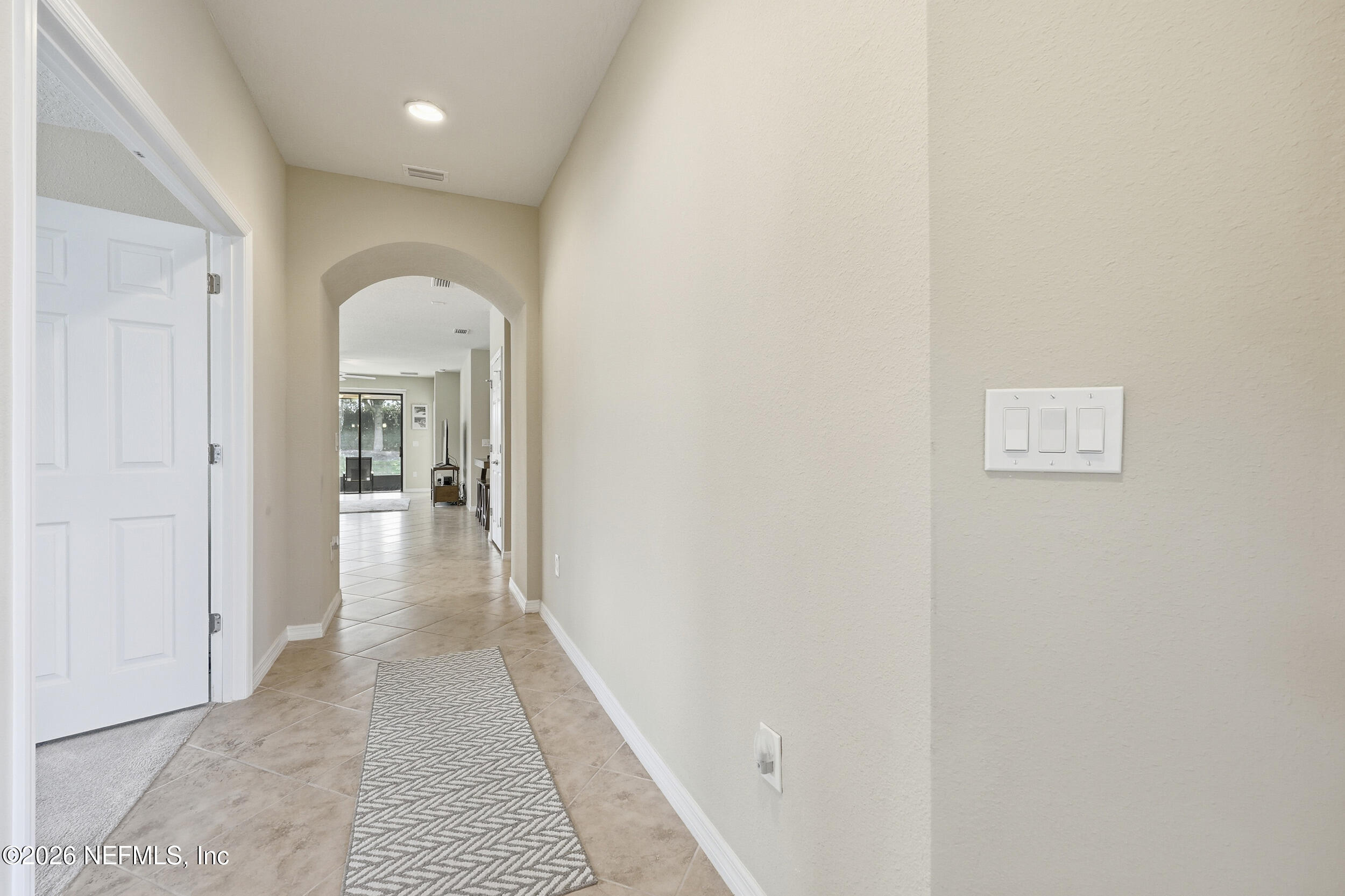 258 Rock Spring Loop St. Augustine, FL 32095 - Photo 3 of 31 a view of a hallway