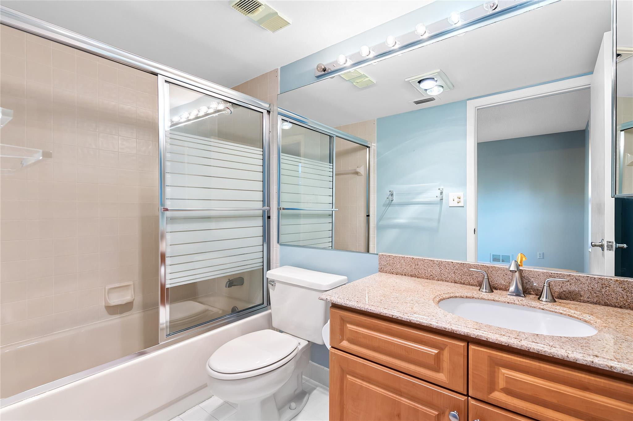 7580 Regency Lakes Drive, Unit 101 Boca Raton, FL 33433 - Photo 19 of 35 ensuite attached to second bedroom