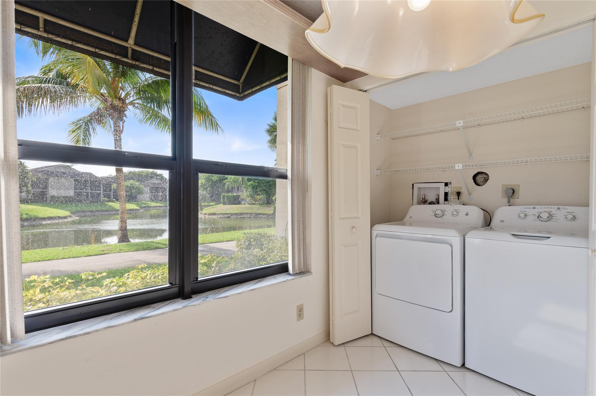 7580 Regency Lakes Drive, Unit 101 Boca Raton, FL 33433 - Photo 28 of 35 In unit laundry area