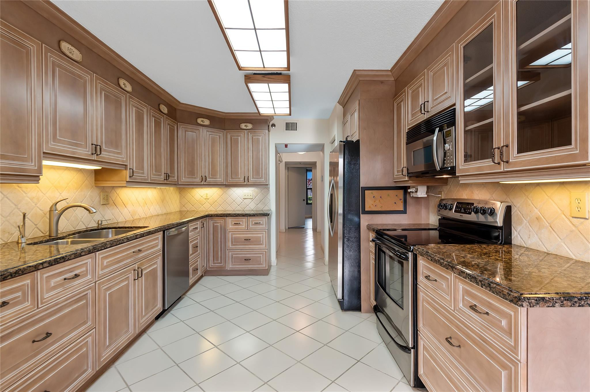 7580 Regency Lakes Drive, Unit 101 Boca Raton, FL 33433 - Photo 9 of 35 Generous w/Granite & SS appliances