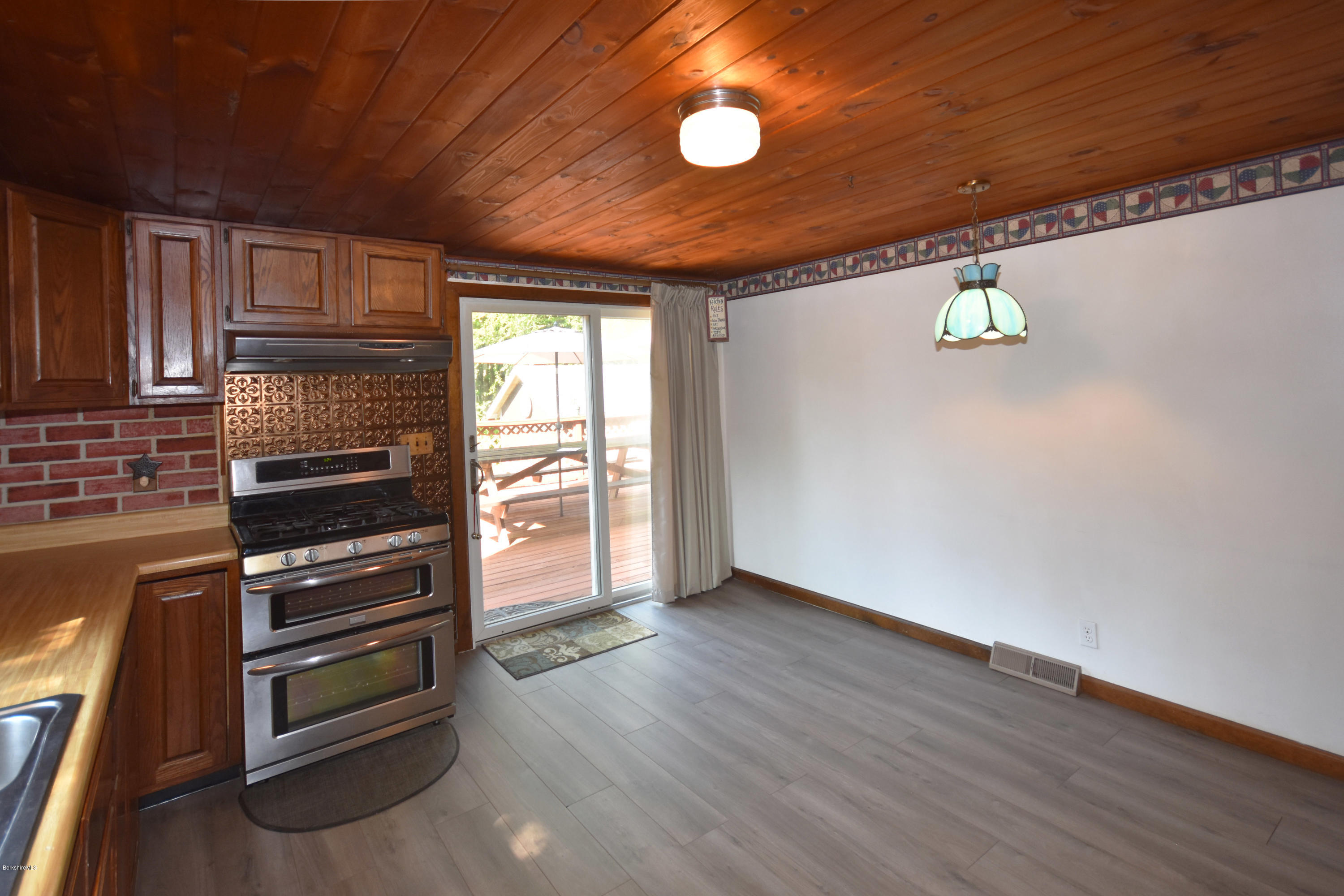 17 Raymond Road Peru, MA 01235 - Photo 14 of 57 a view of an empty room with wooden floor and a window