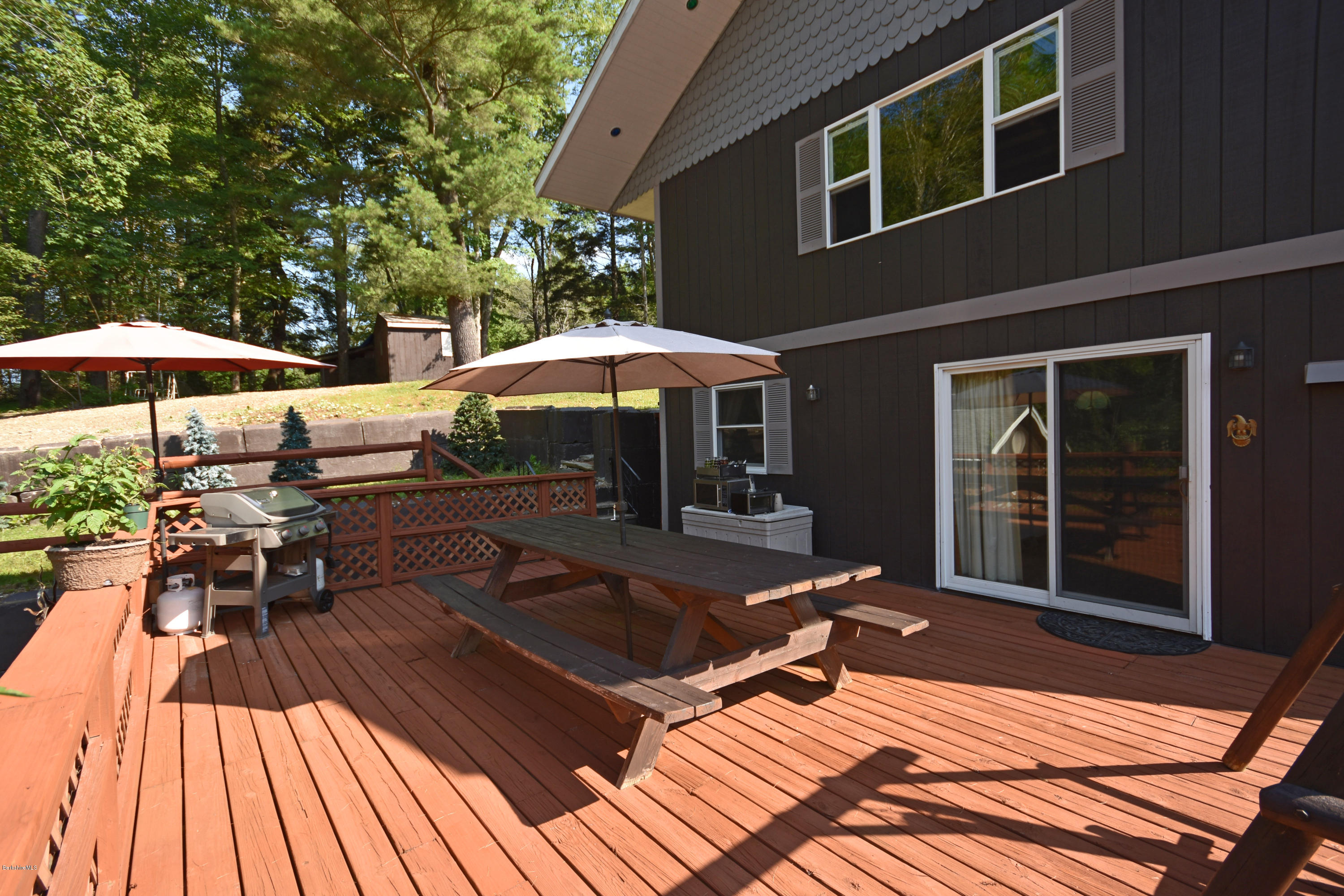 17 Raymond Road Peru, MA 01235 - Photo 50 of 57 a view of a house with chairs and wooden floor