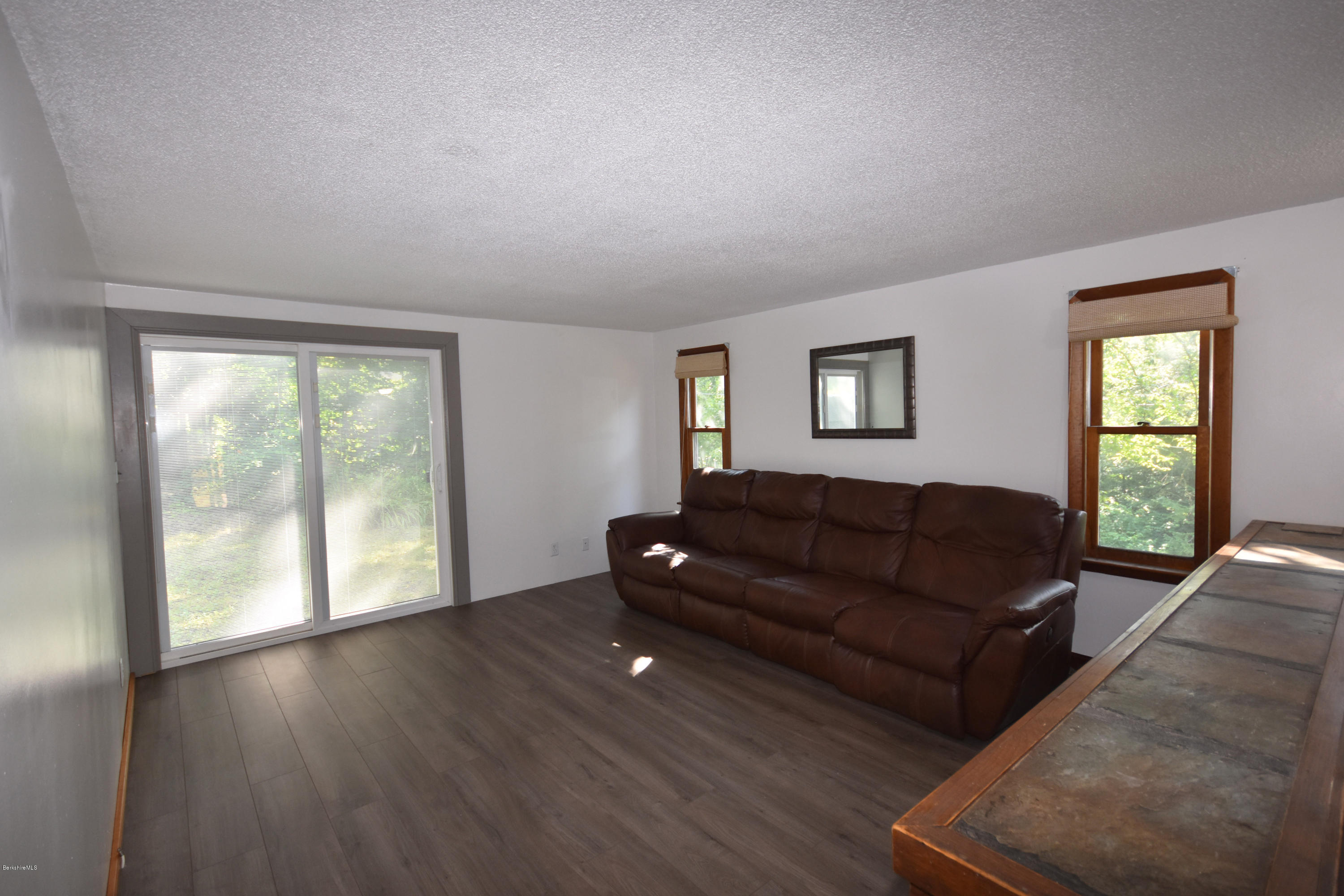 17 Raymond Road Peru, MA 01235 - Photo 8 of 57 a living room with furniture and wooden floor