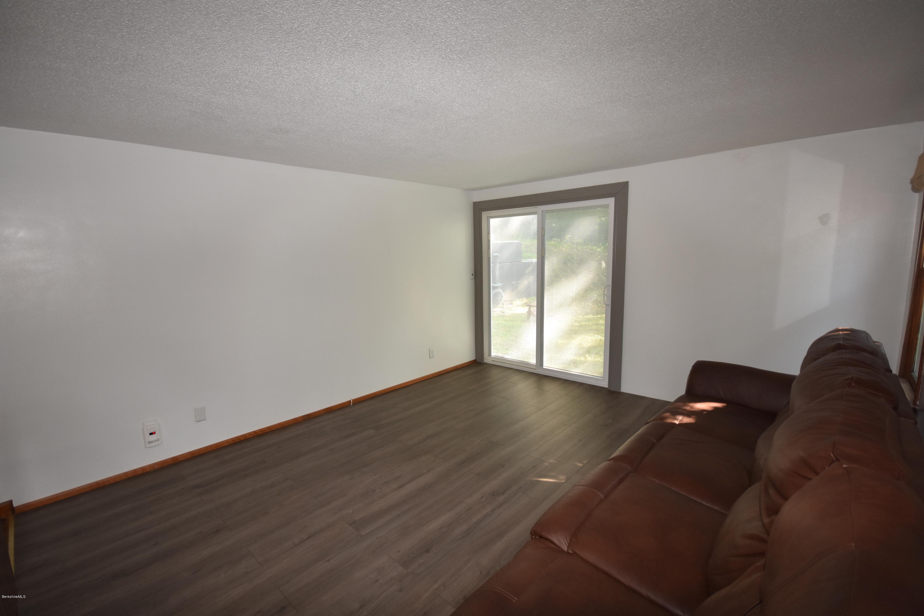 17 Raymond Road Peru, MA 01235 - Photo 9 of 57 a view of an empty room and window