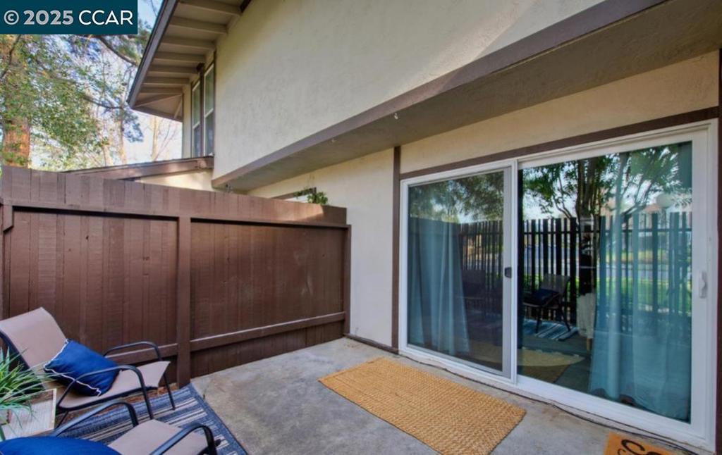 5434 Roundtree Court Concord, CA 94521 - Photo 4 of 23 a view of a balcony with chair and front door