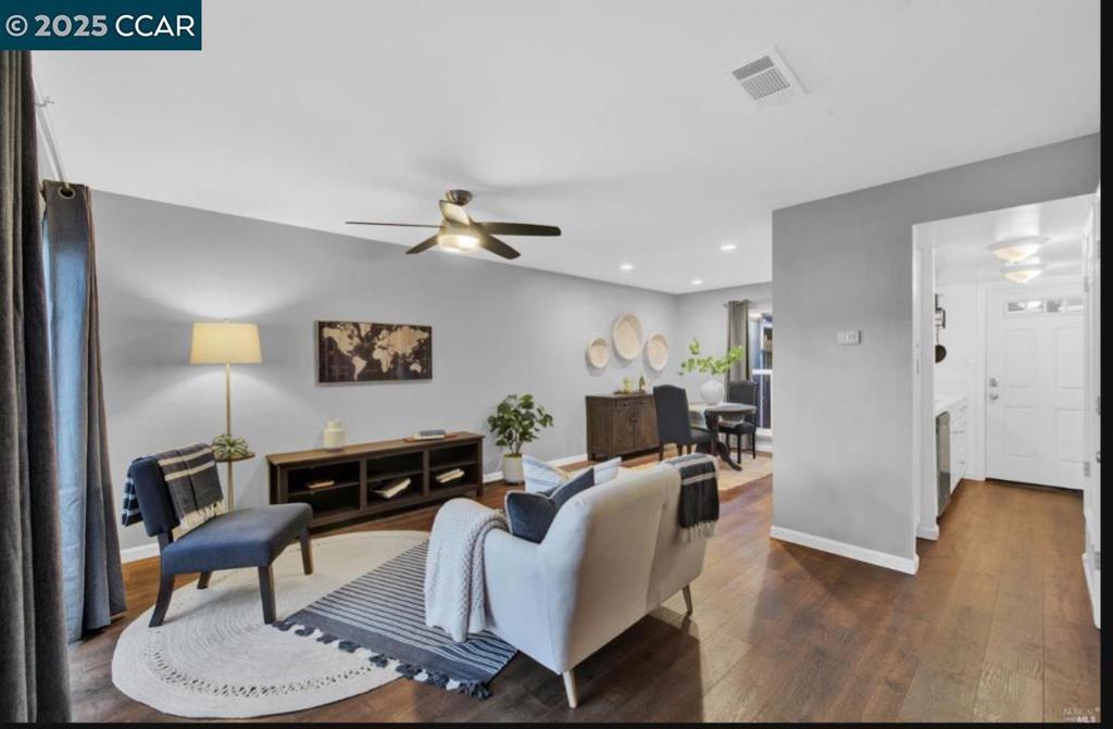 5434 Roundtree Court Concord, CA 94521 - Photo 6 of 23 a living room with furniture and a wooden floor
