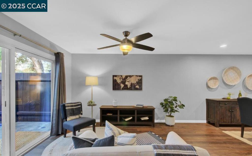 5434 Roundtree Court Concord, CA 94521 - Photo 7 of 23 a living room with furniture and a fireplace