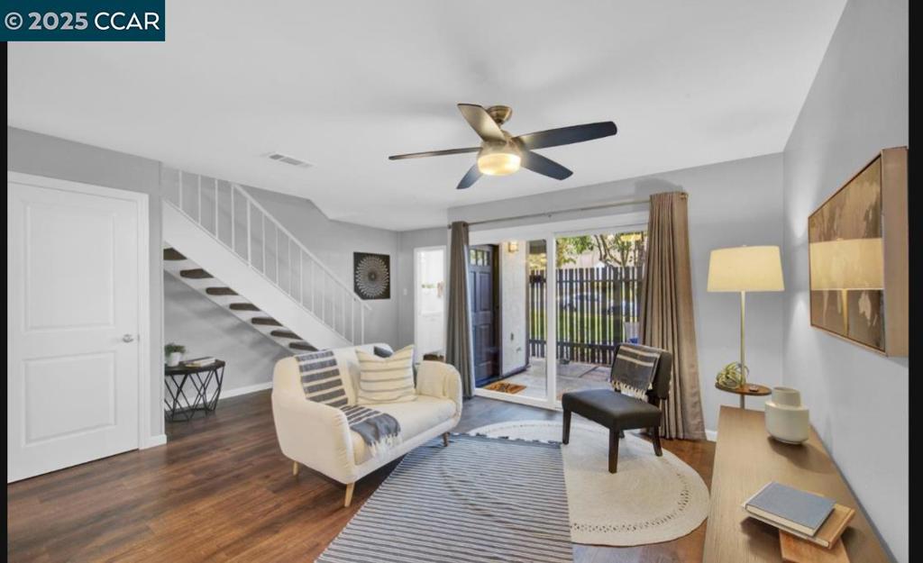 5434 Roundtree Court Concord, CA 94521 - Photo 9 of 23 a living room with furniture and a wooden floor
