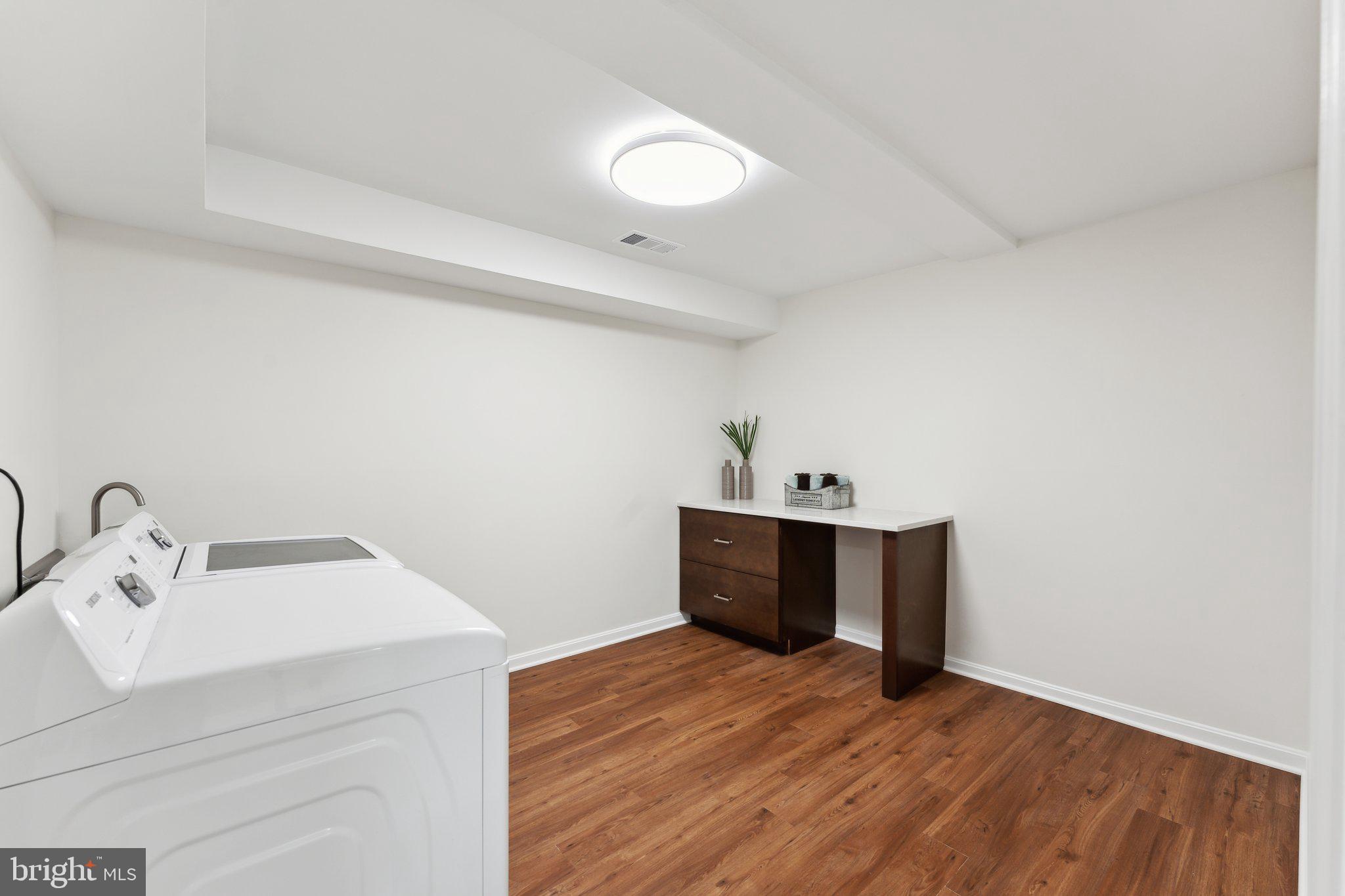 2109 Carrhill Road Vienna, VA 22181 - Photo 47 of 58 Basement Laundry room with extra storage