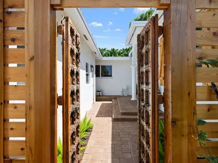 a balcony view with a hardwood floor