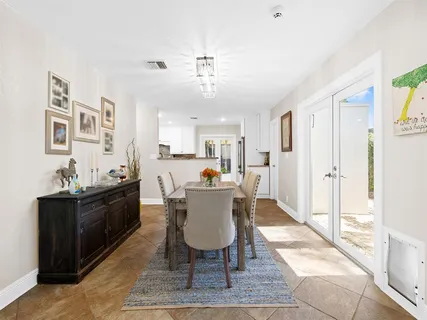 a view of a dining room with furniture