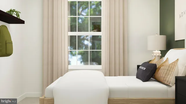 a bedroom with a bed and a window