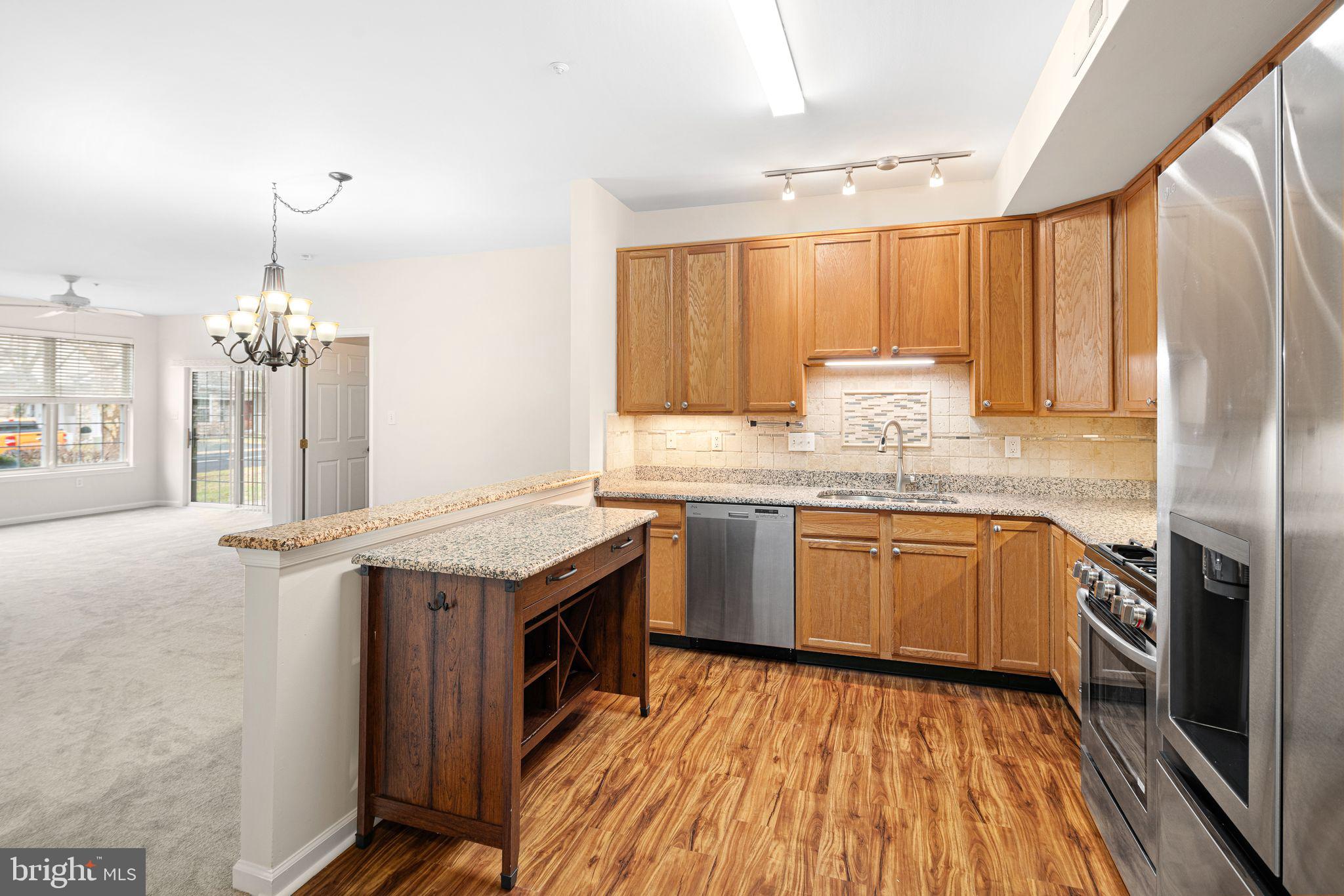 1364 Nicklaus Drive Springfield, PA 19064 - Photo 11 of 25 a kitchen with a sink stove and refrigerator