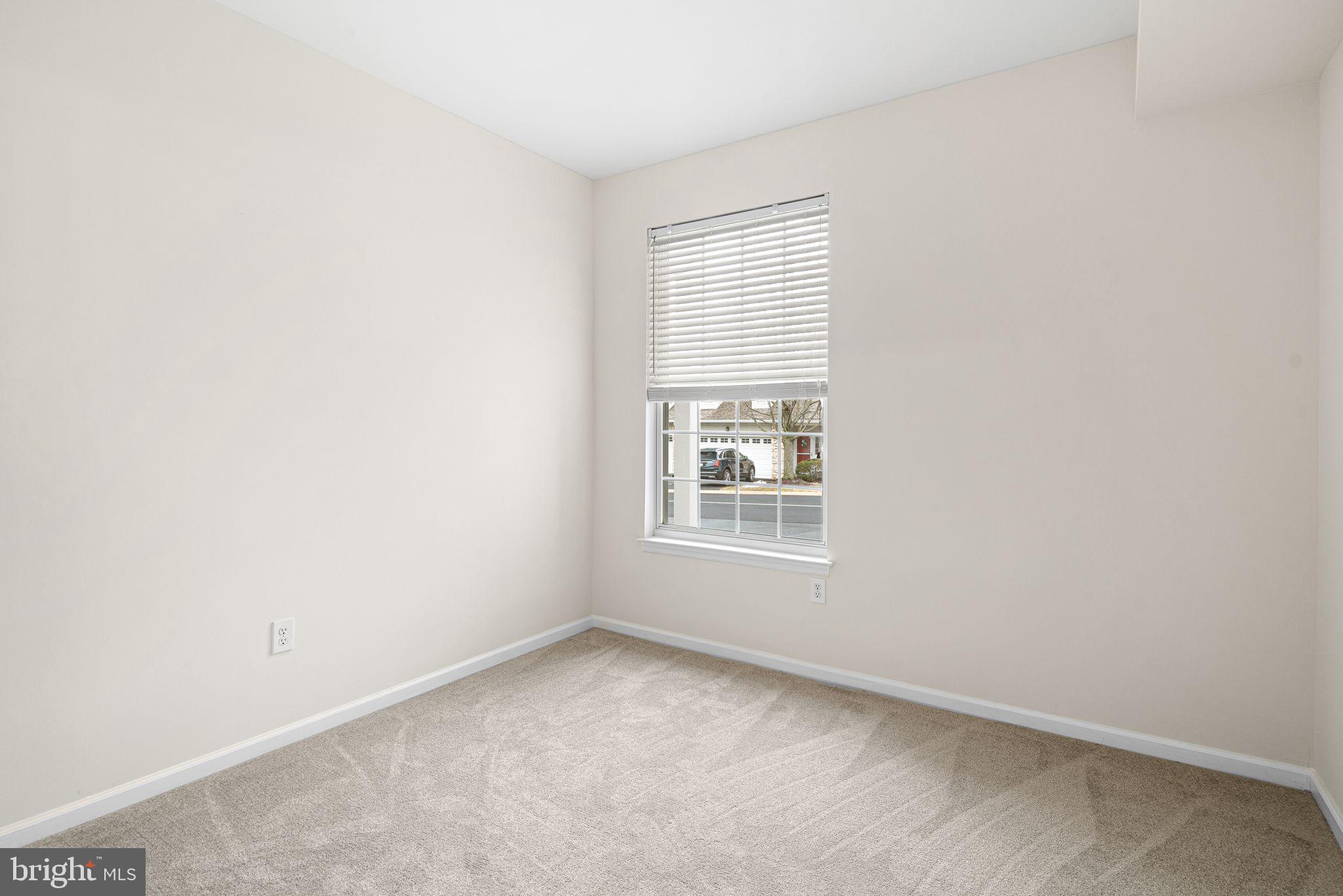 1364 Nicklaus Drive Springfield, PA 19064 - Photo 16 of 25 an empty room with a window
